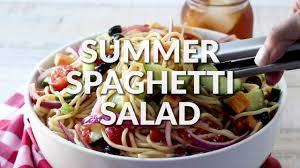 For this dish, al dente spaghetti noodles are tossed in a prepared italian dressing with cubes of salami, mozzarella cheese, ripe olives, peppers, scallions and a sprinkle of parmesan cheese. Summer Spaghetti Salad Video The Country Cook