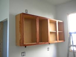 The benchmark for the height of kitchen cabinets is due to the fact that the degree of convenience in performing various operations on their work surfaces depends on this indicator. How To Hang Cabinets Sarah S Big Idea