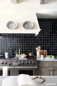 Classic white subway tile with black grout, black countertops, open shelving and white. 11 Black Kitchens Black Cabinet And Backsplash Ideas