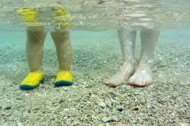 In this article, we are going to look at. Bare Mothers Feet And Baby Feet In Yellow Aqua Shoes Standing Stock Photo Picture And Royalty Free Image Image 69846778