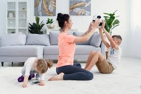 Premium Photo | Sports mom with son doing morning work-out at home. mum and son  do exercises together, healthy family lifestyle concept