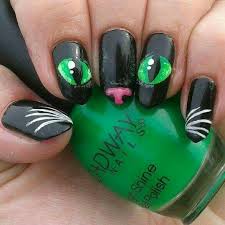 These Cute Nails Could Just Be The Finishing Touch To Your Halloween Theme Halloweentoenailart Holidaynai Halloween Nails Nail Art Designs Halloween Nail Art