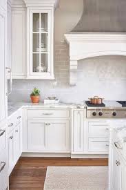 Simple white cabinets and/or counters and backsplash provide the perfect backdrop. 50 Best White Kitchen Design Ideas To Inspiring Your Kitchen Traditional White Kitch Kitchen Cabinet Design White Kitchen Design Backsplash For White Cabinets