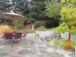 Adding stones and pavers to the landscape can be as simple as placing rocks collected from around your property into artistic designs or as complex as hiring a mason to install a flagstone path. Flagstone Paving Ideas Landscaping Network