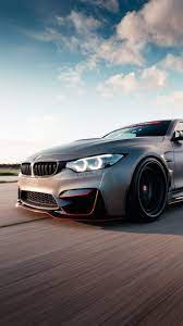 720x1280 Bmw M4 On Road Luxurious Car Wallpaper Bmw M4 Bmw Car Wallpapers