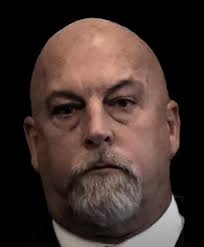 When outside, Higgins had the hoodie down.