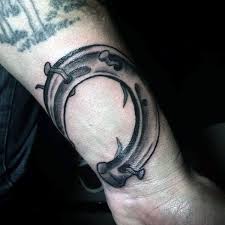 One of the simplest good luck tattoo symbols with meaning behind them is probably the giba auja, which is an ancient rune symbol, said to bring good luck to the wearer. Horseshoe With Twisted Nails Mens Wrist Tattoos Horse Shoe Tattoo Tattoo Designs Men Wrist Tattoos For Guys