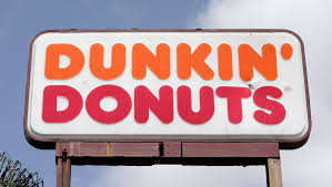 The line was very long and many drivers were getting impatient. New Dunkin Store Caters To Rushed Customers