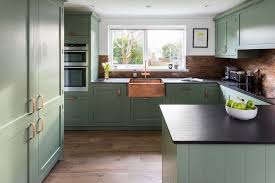 Copper Backsplash Green Cabinets Black Countertops Green Kitchen Cabinets