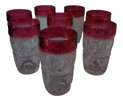 These glasses are best for serving gin mixed with a tonic or into a cocktail, as the wide rim allows for more ice in the glass and an accompanying garnish to complete your drinking. 1930s Cranberry Pressed Glass Drinking Glasses Set Of 8 Chairish