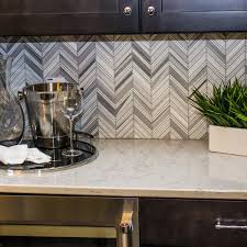 Make dark wall cabinetry less intrusive in a small kitchen by using it only along lower wall sections. Best Kitchen Backsplash Ideas For Dark Cabinets Family Handyman
