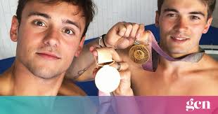 Tom Daley Uses Gold Medal Moment To Blast Anti-LGBT+ Laws • GCN