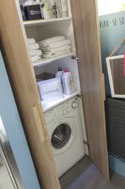 Une Armoire Pour Dissimuler Votre Espace Buanderie Idee Salle De Bain Amenagement Salle De Bain Rangement Salle De Bain