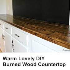 Warm Lovely Diy Burned Wood Countertop Project Homesteading The Homestead Survival Com Wood Countertops Diy Wood Counters Wood Diy