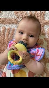 Ayla stunningly modelling one of our soft absorbent dribble bibs 🌈 thank  you beautiful bubba 🩷