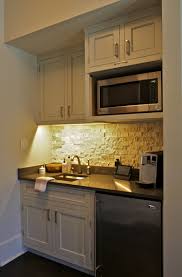 This Coffee Bar Kitchenette Sits In A Master Bedroom For Early Morning Coffee Making Or Late Night Snacks Kitchenette Design Kitchenette Basement Kitchenette