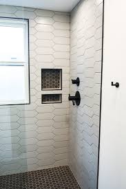 Identify the most visible wall when you walk into the room. 29 Ideas For Gorgeous Shower And Bathroom Tiles