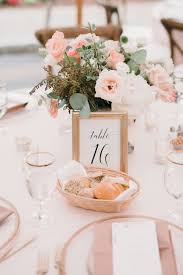 Romantic Backyard Wedding Covered In Flowers Greenery Wedding Decor Wedding Reception Tables Wedding Centerpieces
