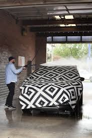 Flip the area rug over and vacuum its underside. Can You Wash A Rug At The Car Wash We Find Out Cleaning Area Rugs Dining Rug How To Wash Rugs