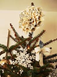 To top the tree, we made a star topper out of driftwood and seashells. 20 Easy Handmade Holiday Ornaments And Decorations Creative Christmas Trees Diy Tree Topper Christmas Tree Toppers Unique