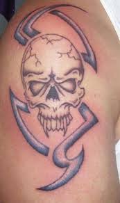 See 80 more skull tattoo ideas here. Skull Tattoo Designs And Ideas Skull Tattoo Meanings And Pictures Tribal Tattoos For Men Skull Tattoo Design Tattoo Arm Designs