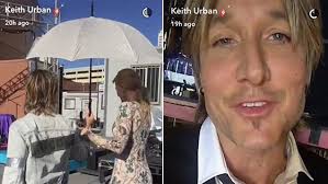 The tattoo blog (ryan phillippe and keith. Keith Urban Showcases His Tattoos As He Buys Umbrellas Daily Mail Online