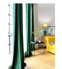 Emerald green and gray living room features a gray velvet tufted sofa lined with emerald green greek key pillows, placed in front of a window dressed in platinum gray curtains, facing a pair of dark gray. Emerald Green Velvet Curtains You Ll Love In 2021 Visualhunt
