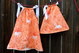 Learn how to make this little girls peasant style dress with an elasticated waist from a cute vintage pillowcase. Diy Pillowcase Baby Dress Pattern Pretty Prudent