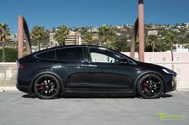 It features the gorgeous exterior wrap, giving it quite a menacing & unique look. Black Tesla Model X With Matte Black 22 Inch Tss Flow Forged Wheels By T Sportline Tesla Model S 3 X Y Accessories