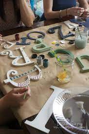 Baby Shower Activity Everyone Paints A Letter For The Nursery Baby Shower Baby Shower Activities New Baby Products