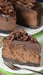 Triple Chocolate Cheesecake With Oreo Crust Recipe Desserts Chocolate Desserts Triple Chocolate Cheesecake