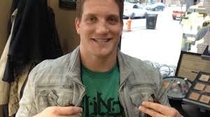 A.J. Hawk donates his hair
