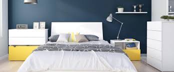 If you have any monochrome or neutral mix going on in your bedroom, whether it's white and gray, cream and tan, or black and white, painting the walls a vibrant shade of yellow can add a lot of interest and liven up the space. Decorating With Yellow Furniture Decor Design Ideas