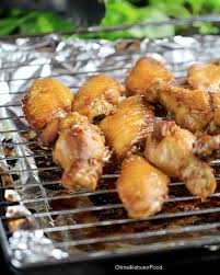 Tossed in a savoury, sweet, garlicky asian marinade, then baked in the oven and basted until deeply golden and. Honey Garlic Chicken Wings Glazed Version China Sichuan Food