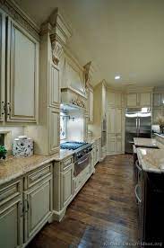 Pin By Danielle Warwick On Kitchens Antique White Kitchen Kitchen Design Antique Kitchen Cabinets