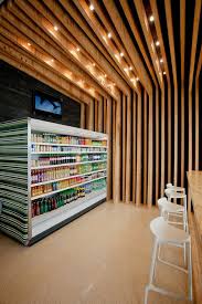Image Result For Staggered Wood Suspended Ceiling Panels Curved Grocery Store Design Shop Interior Design Wood Slat Wall