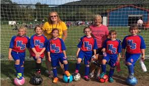 Mrs. McCabe and Mrs. Selgrade went to a third grade soccer game to cheer