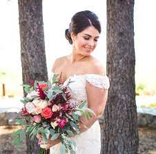 For a beach boho wedding vibe, the bride wanted to add the rose gold arch to the backdrop of the ceremony. Boho Chic Wedding Flower Styles