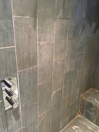 Run hot water in the shower with the doors and windows closed for a few minutes before cleaning. Removing Limescale Staining From Riven Slate Shower Tiles In Teddington Shower Tile And Grout Cleaning Tips