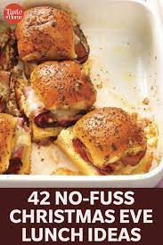 42 No Fuss Christmas Eve Lunch Ideas To Serve Your Guests Christmas Lunch Recipes Potluck Recipes Christmas Eve Meal