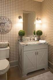 The modern mirror above the sink as well as the contemporary blush pink bulb make it feel like. Pin By Laurie S Home Furnishings On Tartan Buffalo Check Farmhouse Chic Bathroom Rustic Powder Room Farmhouse Powder Room