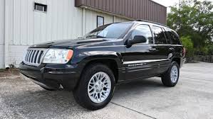Image result for Brilliant Black 2004 Jeep