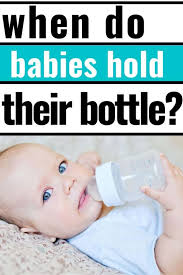 When Should Baby Be Holding Bottle Full List Of Adaptive Skills From 6 9 Months In 2020 Cool Baby Stuff Baby Learning Baby Month By Month