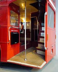 Back Of Old Red London Buss Mannequins Hanging And Stepping Off The Back Into The Country Scene Bus Interior London Bus Double Decker Bus