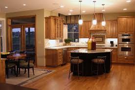 Kitchen colors can be bold, understated, bright or a combination of each. Eclectic Eat In Kitchen Stainless Steel Appliances Natural Wood Trim Granite Countertops Island Seat Natural Wood Trim Hickory Kitchen Hickory Kitchen Cabinets