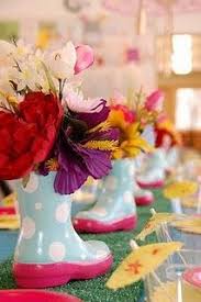April Showers Bring May Flowers Party Decor Watch For The Little Boots On Sale I Would Set A Spring Baby Shower Baby Shower Centerpieces Spring Theme Party