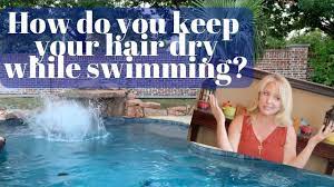 It is important to keep in mind that no swim cap is perfect, and there is no cap that will completely protect your hair from getting wet. How To Keep Your Hair Dry While Swimming Protect Hair When Swimming Youtube