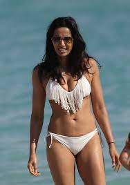 Owing to a combination of anatomical factors and the tightness of the fabric covering the area, the crotch and mons pubis may display a shape resembling the forefoot of a camel. Padma Lakshmi Wearing A White Bikini In Miami Beach Celebrityslips Com