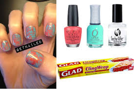 If you like coral nail polish, you might love these ideas. Diy Nail Art Coral And Aqua Saran Wrap Manicure Video Huffpost Life