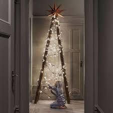 A by amara, kartell, missoni home, orla kiely, fornasetti People Are Ditching Real Trees For The Ladder Christmas Trees